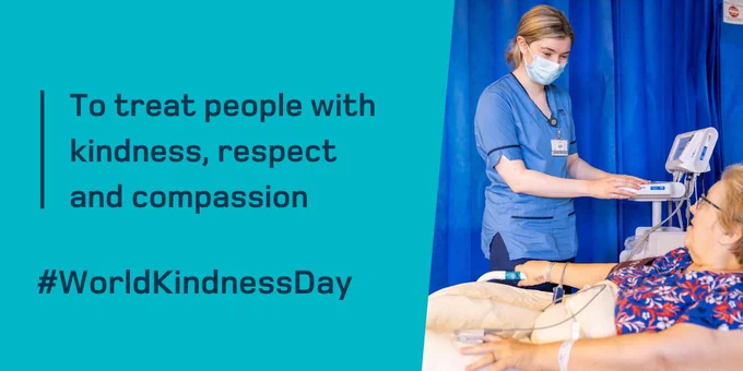 A picture of a nurse in uniform smiling behind a mask at a patient in a hospital bed. Alongside the words "to treat people with kindness, respect and compassion. #WorldKindnessDay"