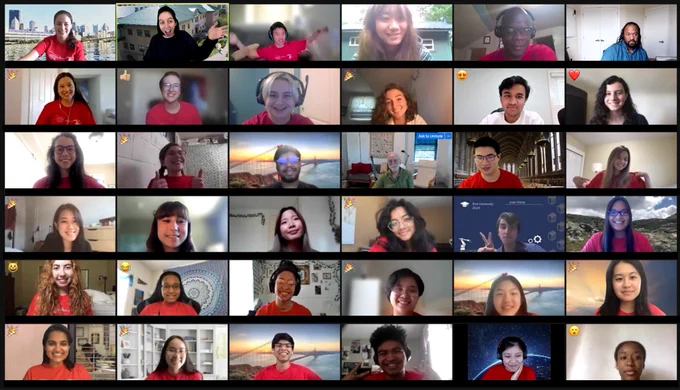 A group photo of last summer's researchers. Since it was a virtual program, it's a screenshot of 36 people in their individual Zoom screen boxes. Most are smiling and wearing the red shirt they designed together
