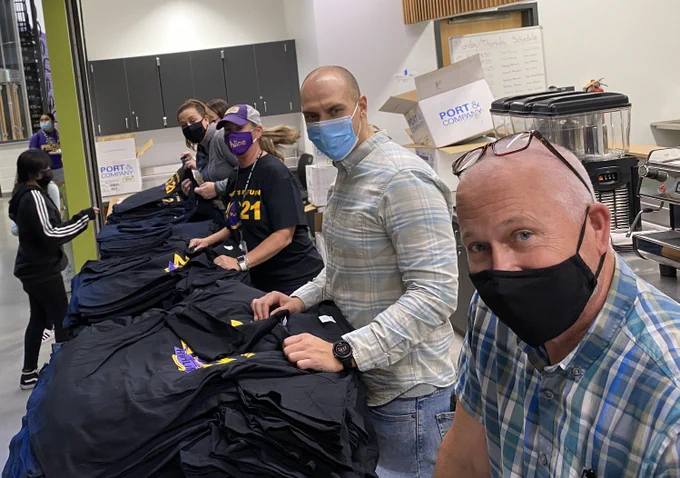 Skanska staff helped hand out tshirts at HHS