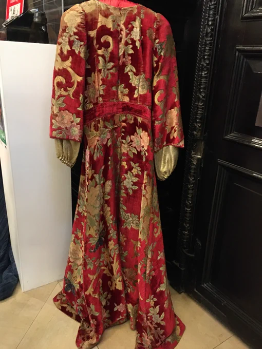 A red and gold gown.