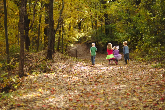 Children walking on the Ray Harral Nature Park Trail System in Tulsa County, Oklahoma. Photo courtesy of City of Broken Arrow. 
