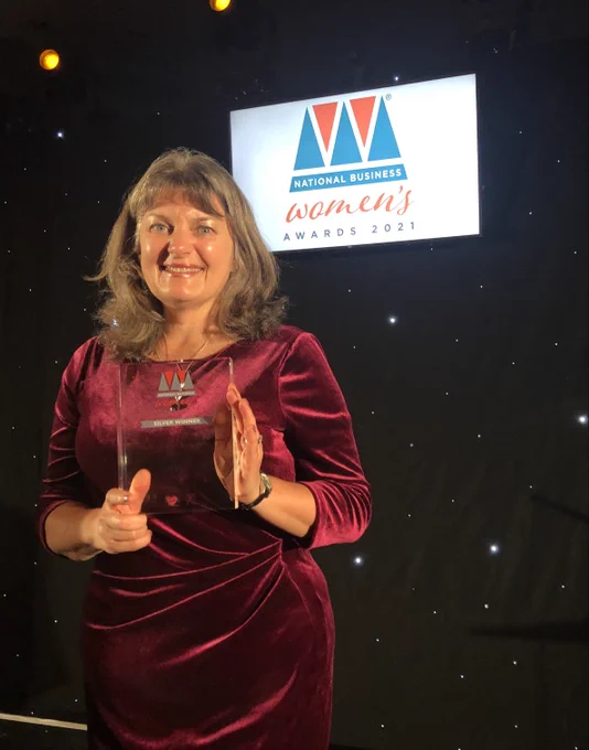 Karen Atkinson winning silver for Southern England Woman of the Year award at the National Business Woman's Awards