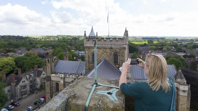 Person takes picture of Rippon Cathedral from above 