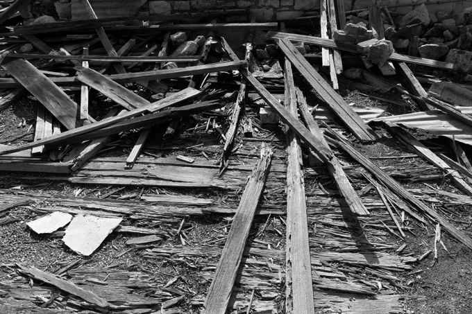 ruins of a building with wood