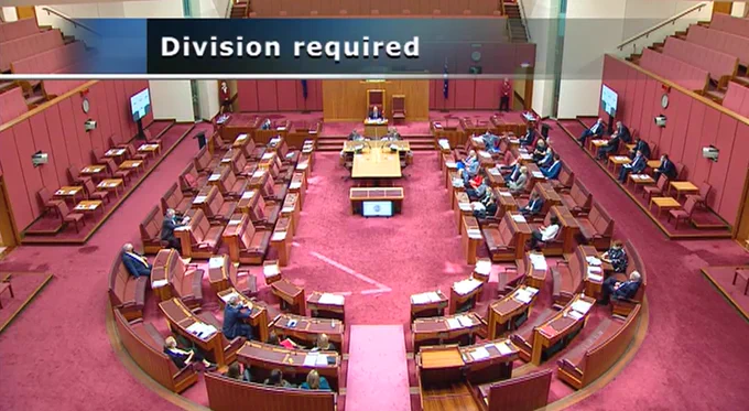 Senate chamber photo with Greens & some cross benchers on one side, Liberal & Labor on the other