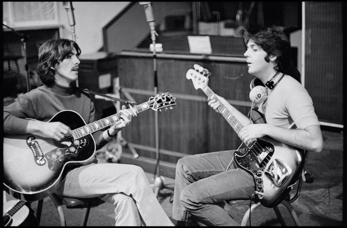 Photo of Paul and George Harrison atThe Beatles "White Album" recording sessions. Taken by Linda McCartney