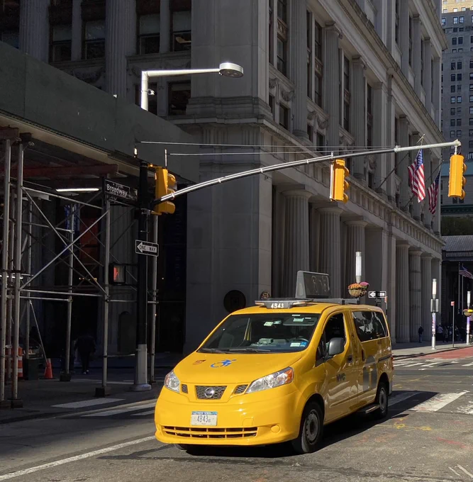 A wheelchair accessible Taxi travels in Manhattan.