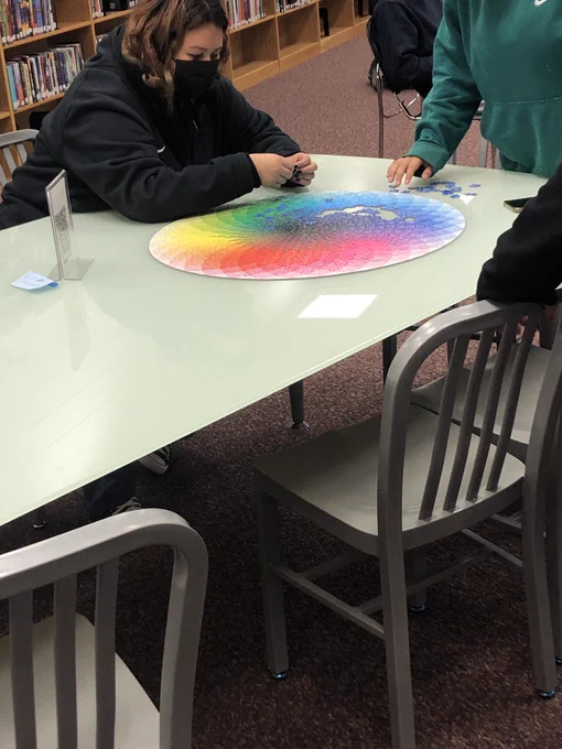 Students trying to find the last missing pieces of the puzzle