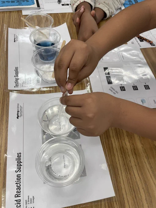 Picture of student getting a liquid for activity sheet.