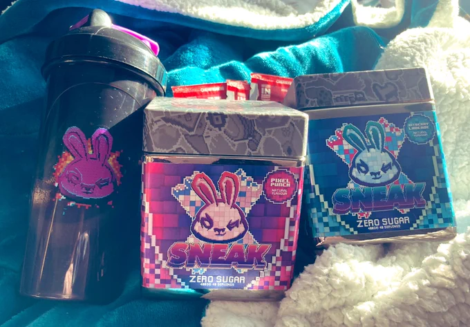 An image of a drinks shaker and two cube tubs of powdered Sneak energy drink
