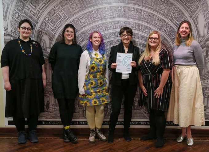 The members of the Centre for Public Engagement and Vice Principal Philippa Lloyd stand together holding the Platinum Engage Watermark trophy