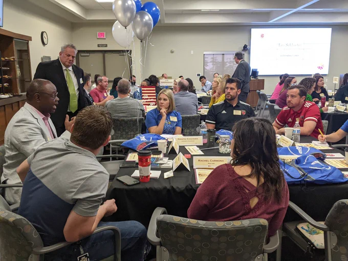 Frank Narducci oversees a conversation with Andersen Elementary during a School Connect social event at District Office.
