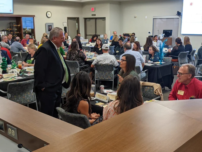 Frank Narducci oversees a conversation with Fulton Elementary during a School Connect social event at District Office.