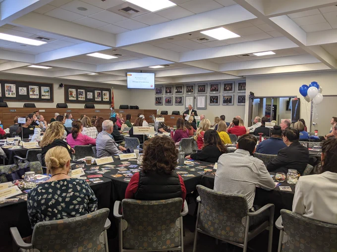 Frank Narducci offers opening remarks during a School Connect social event at District Office.