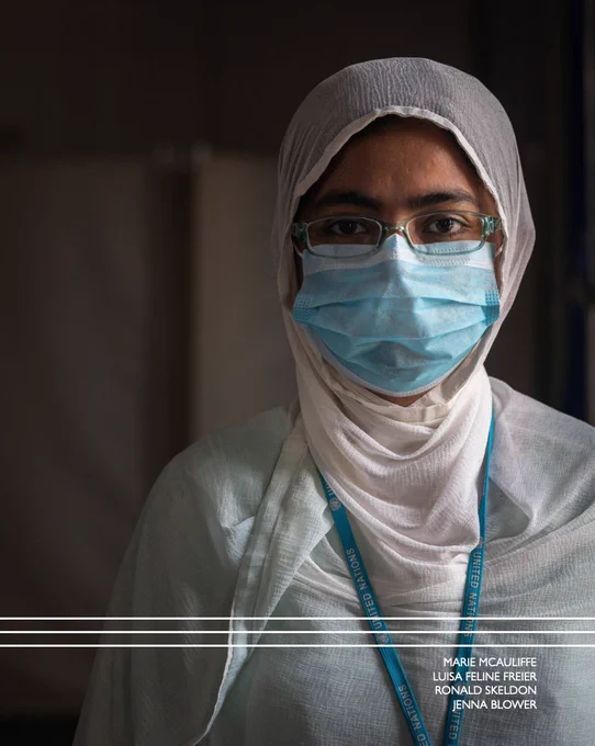 woman wearing a face mask / cover of chapter 5 of the world migration report 2022