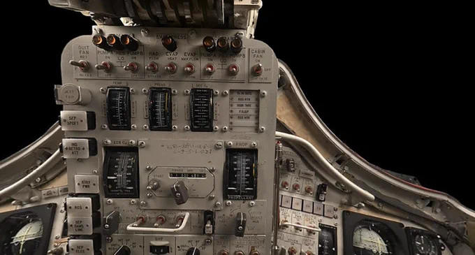 An interior of a space machine photographed against a black backdrop 
