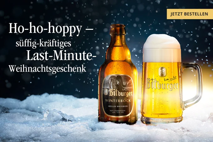 Bitburger Winterbock mit einem Glasseidel in winterlicher Kulisse. 