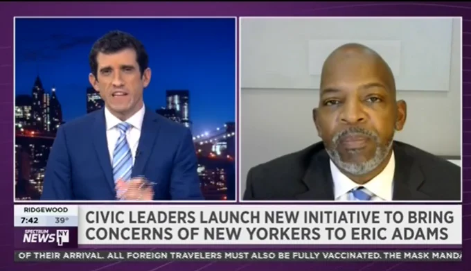 Dr. Shango Blake on live television with Bobby Cuza, on NY1.