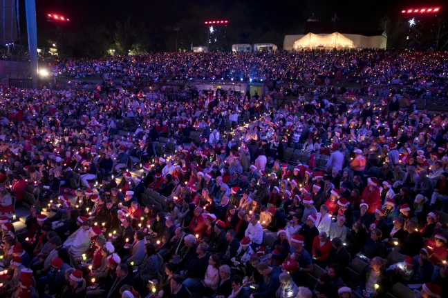 A sea of people from a previous Carols by Candlelight