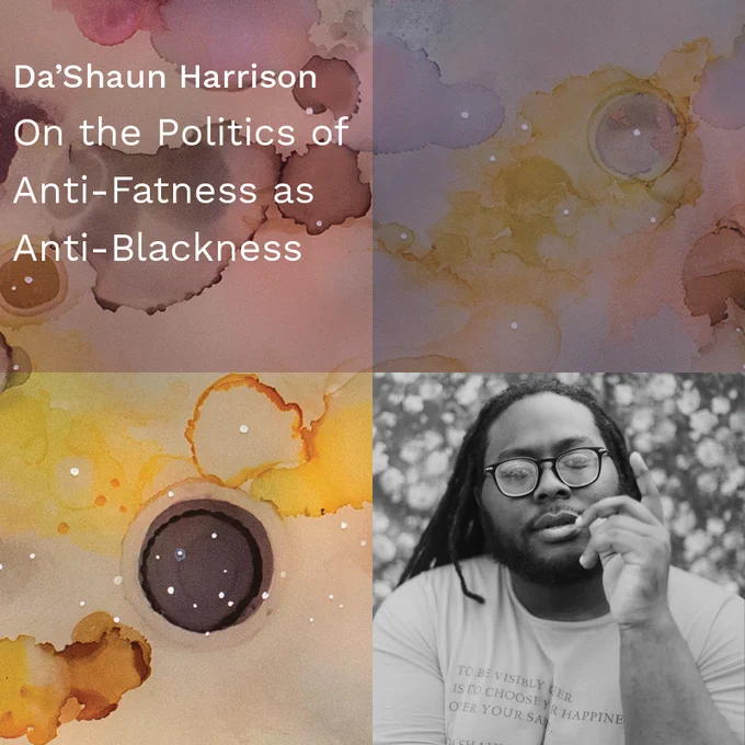 Da'Shaun Harrison black and white headshot. Design around photo of Da'Shaun is watercolor gradient in red, lavender, yellow, and drops of other colors throughout. Da'Shaun in their photo is a Black person with hair past their shoulders and is wearing glasses and graphic t-shirt. Their arm is up and one finger is pointing up.