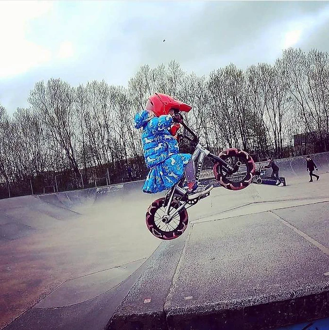 Daisy shows off her BMX skills at the skate park