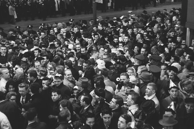 Overhead view of the New Year's Eve crowd celebrating at North State Street and West Randolph Street, Chicago, December 31, 1961. ST-15002870-0010, Chicago Sun-Times collection, CHM