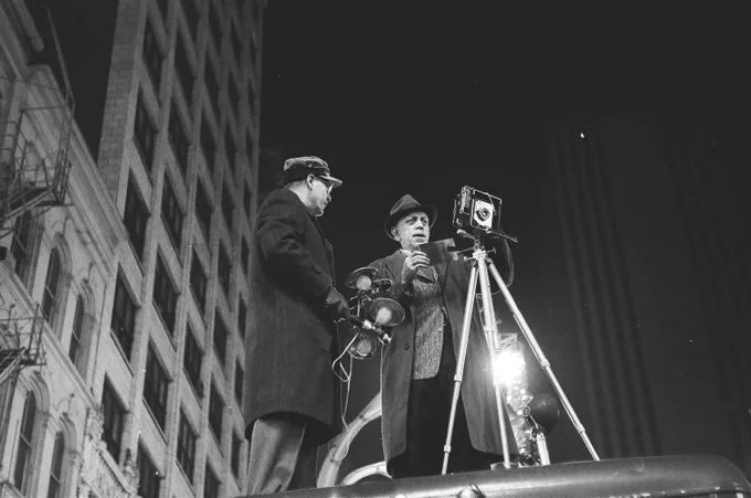 Photographers, most likely from the Chicago Sun-times, document the New Year's Eve crowd at North State Street and West Randolph Street, Chicago, December 31, 1961. ST-15002870-0008, Chicago Sun-Times collection, CHM