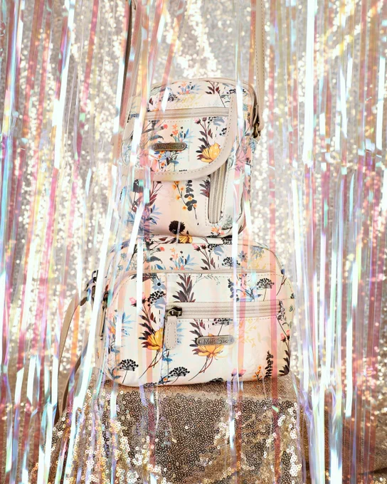 Our Catalina floral micro Everest crossbody bag and mini dynamic crossbody bag are covered in confetti as we celebrate New Years Eve.