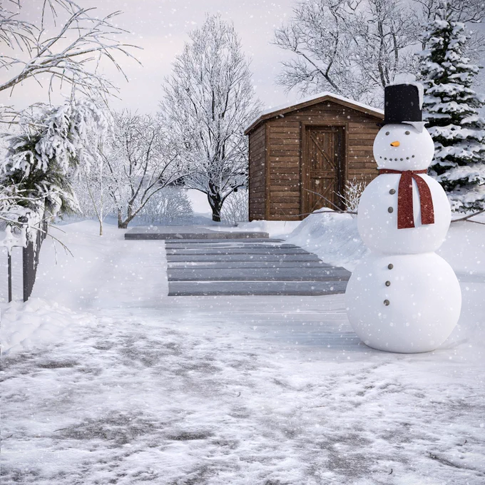 CGI visual showing a snowman wearing a red scarf and a black top hat. The snowman is positioned infront of a mini wooden cabin. The visual is showcasing a white snowy Christmas.