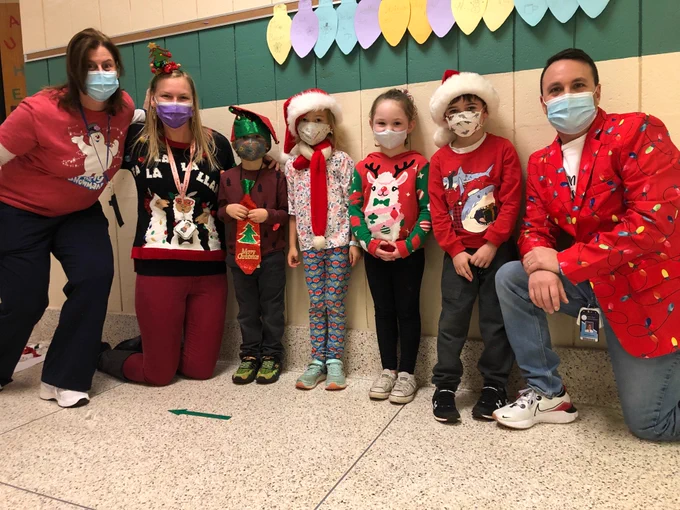A few of Mrs. Brecht's kindergarten students and friends dressed in holiday attire.