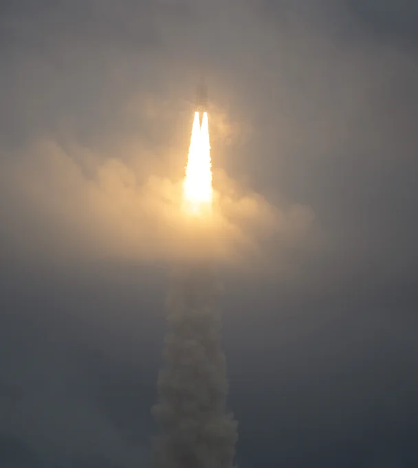 Arianespace's Ariane 5 rocket launches with NASA’s James Webb Space Telescope onboard, Saturday, Dec. 25, 2021, from the ELA-3 Launch Zone of Europe’s Spaceport at the Guiana Space Centre in Kourou, French Guiana. The James Webb Space Telescope (sometimes called JWST or Webb) is a large infrared telescope with a 21.3 foot (6.5 meter) primary mirror. The observatory will study every phase of cosmic history—from within our solar system to the most distant observable galaxies in the early universe. Photo Credit: (NASA/Bill Ingalls)
