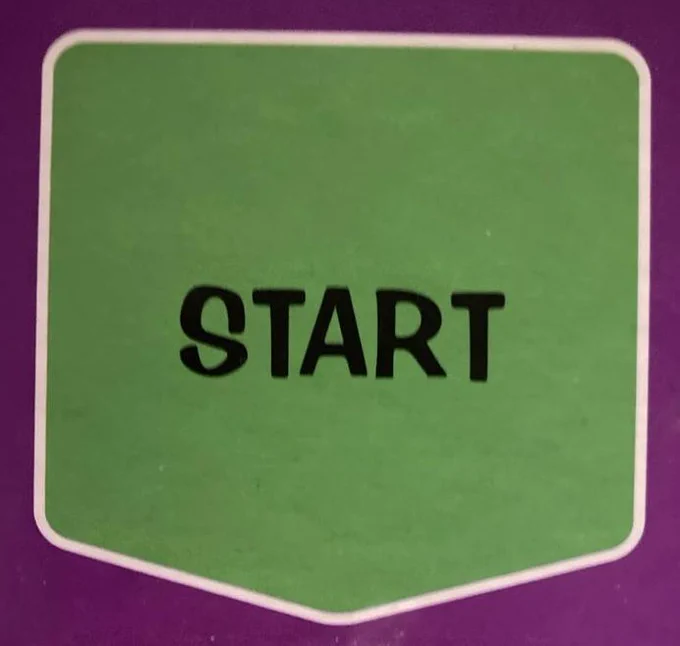 The word 'START' on a bright green background, from a boardgame.