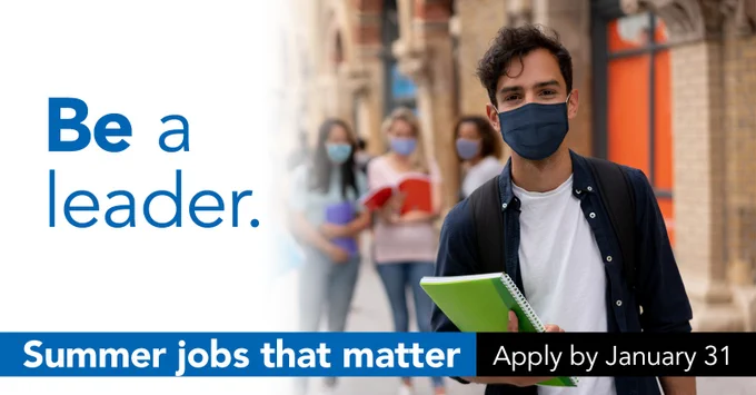 A student in a blue button up shirt and white t shirt is holding a notebook. The text on screen reads "Be a leader. Summer jobs that matter. Apply by January 31." 