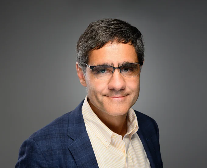 Portrait photograph of Eric Perakslis, PhD, Chief Science & Digital Officer for the Duke Clinical Research Institute and Chief Research Technology Strategist, Duke University School of Medicine
