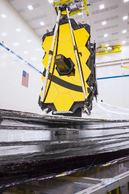 Image from October 2019 after the completion of deployment testing for the Webb telescsope's silver 5-layer, kite-shaped sunshield.