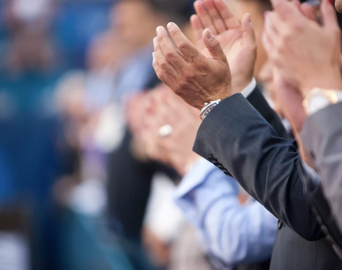 Close up of hands clapping