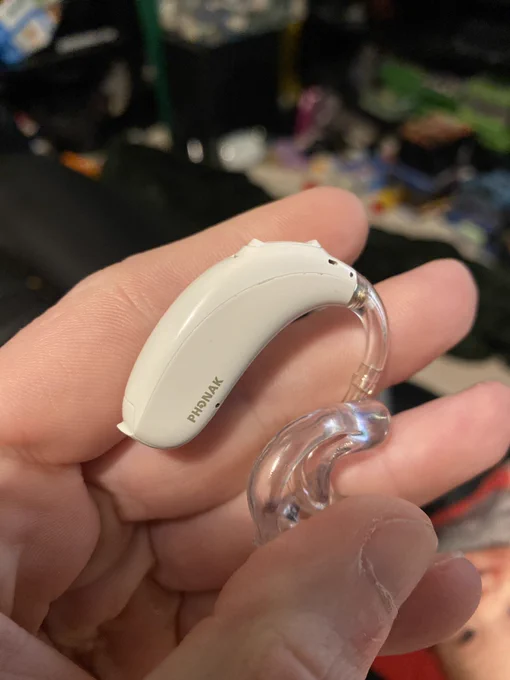 A white hearing aid