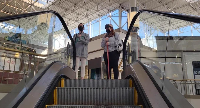 O&M students practicing and learning escalator skills