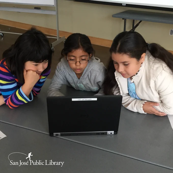 Image: Three girls around a laptop during Spring Break Coding Camp for Girls at Alum Rock (April 2017)