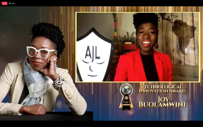 Screenshot of Beloved Community Awards, speech by Dr. Joy Buolamwini in upper right, signature white mask next to her. Beautiful photo of Dr. Buolamwini in white coat and beautiful white glasses on lower left. Text: Technological Innovation Award. Joy Buolamwini.
