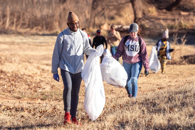 Students picked up trash along the Wichita Falls trail. 
