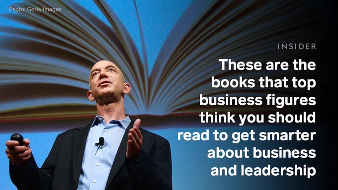 Graphic shows a photo of Jeff Bezos in front of a projected image of a book with overlaying text that reads: “These are the books that top business figures think you should read to get smarter about business 
and leadership.”
