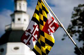 An image of the Maryland flag with the Maryland State House in the background.