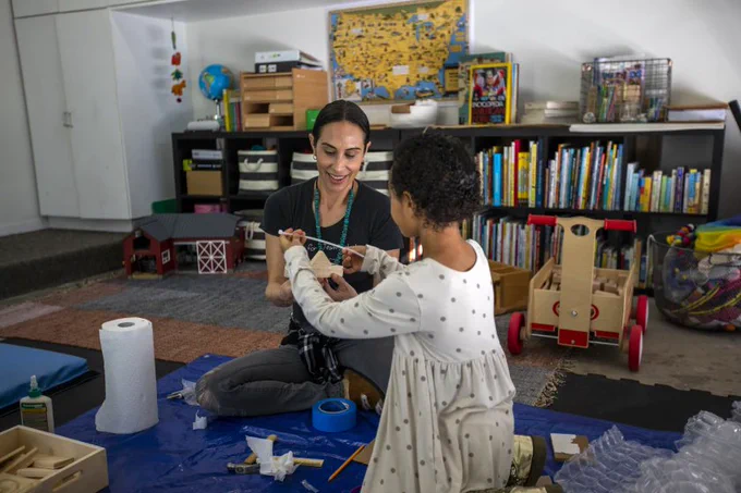 Crista Maldonado-Dunn works with her daughter, Kaia Dunn, 5, during a home schooling class in El Segundo.