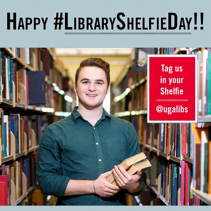 Graphic with photo of student in library stacks holding two books, Happy #LibraryShelfieDAy Tag us in your selfie @ugalibs