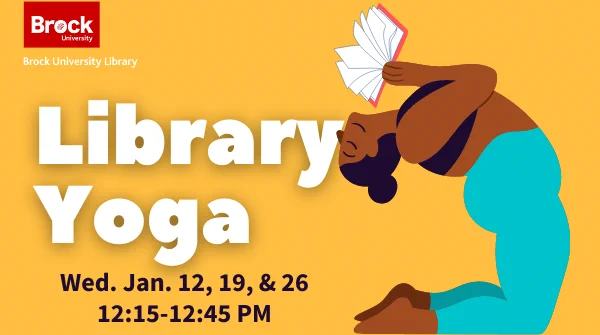 A woman stretches in a yoga pose while holding a book