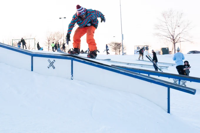 Photo of man on snowboarding rail at Ruby Hill Rail Yard