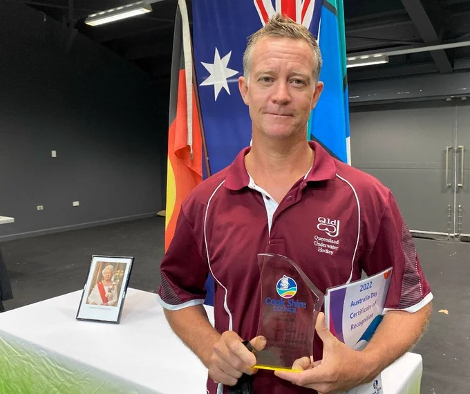 Scott Thomasen collecting the 2022 Sports Award on behalf of the Cooktown Underwater Hockey Club