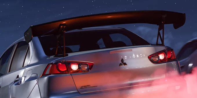 The back end of a Mitsubishi Lancer Evo X with a large spoiler