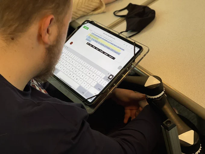 Intern is using text to speech on his iPad to navigate text.